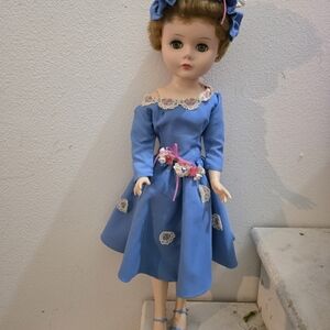 Antique Vintage-Style Doll with Floral Trim